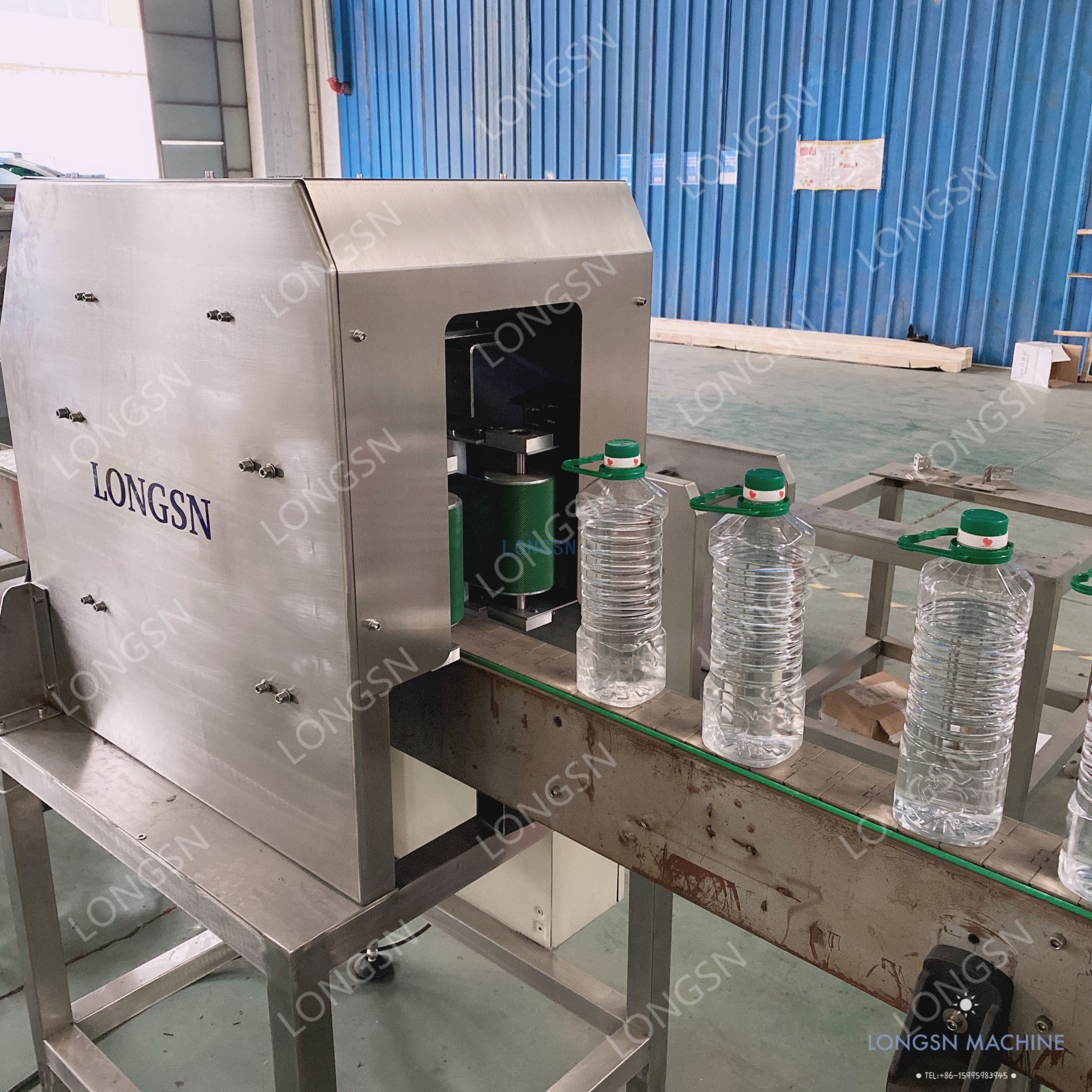 Automatische Hochgeschwindigkeits-PET-Wasseröl-Flaschenhalsgriff-Ringapplikator-Pressmaschine